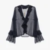 Camisa con mangas largas y volantes