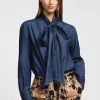 Camisa con mangas largas y lazo