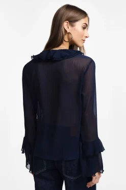 Camisa con mangas largas y volantes
