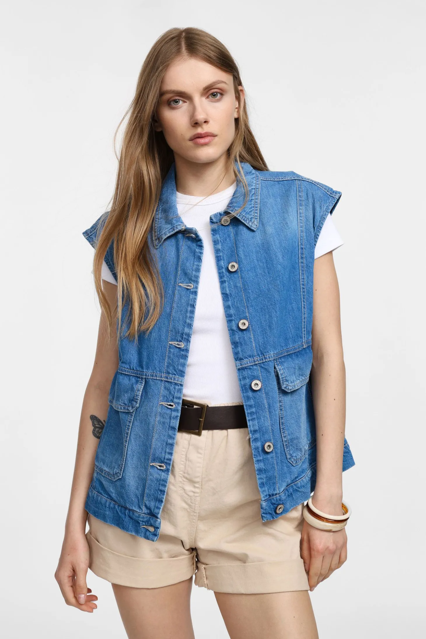 Chaqueta sin mangas con botones