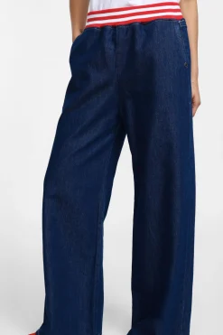 Jeans a gamba larga con elastico a righe