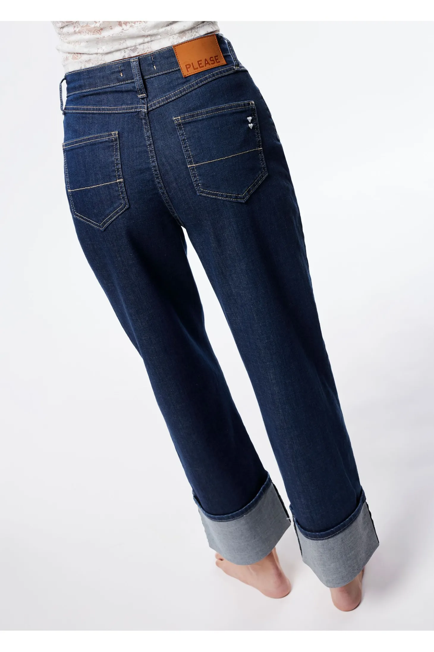 Jeans a gamba larga con risvolti