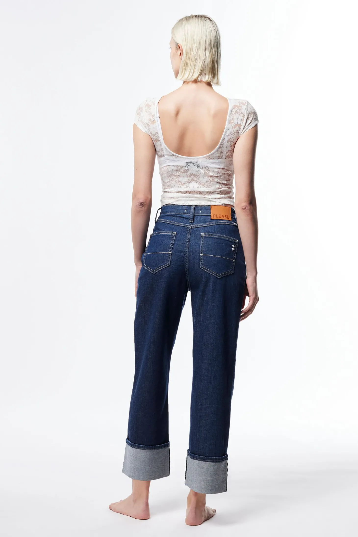 Jeans a gamba larga con risvolti