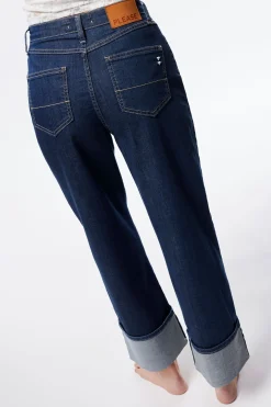 Jeans a gamba larga con risvolti