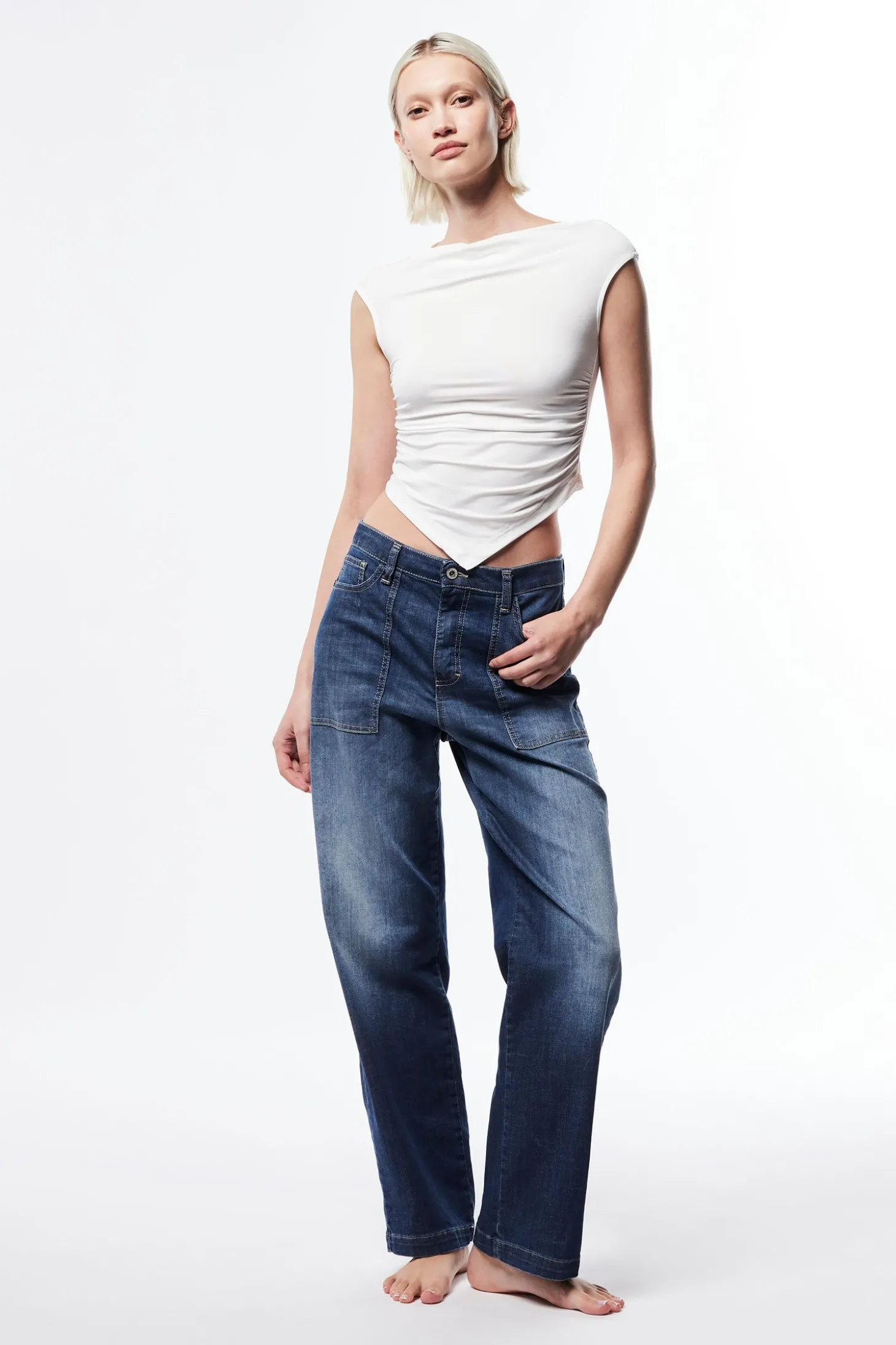 Jeans a gamba larga con tasche