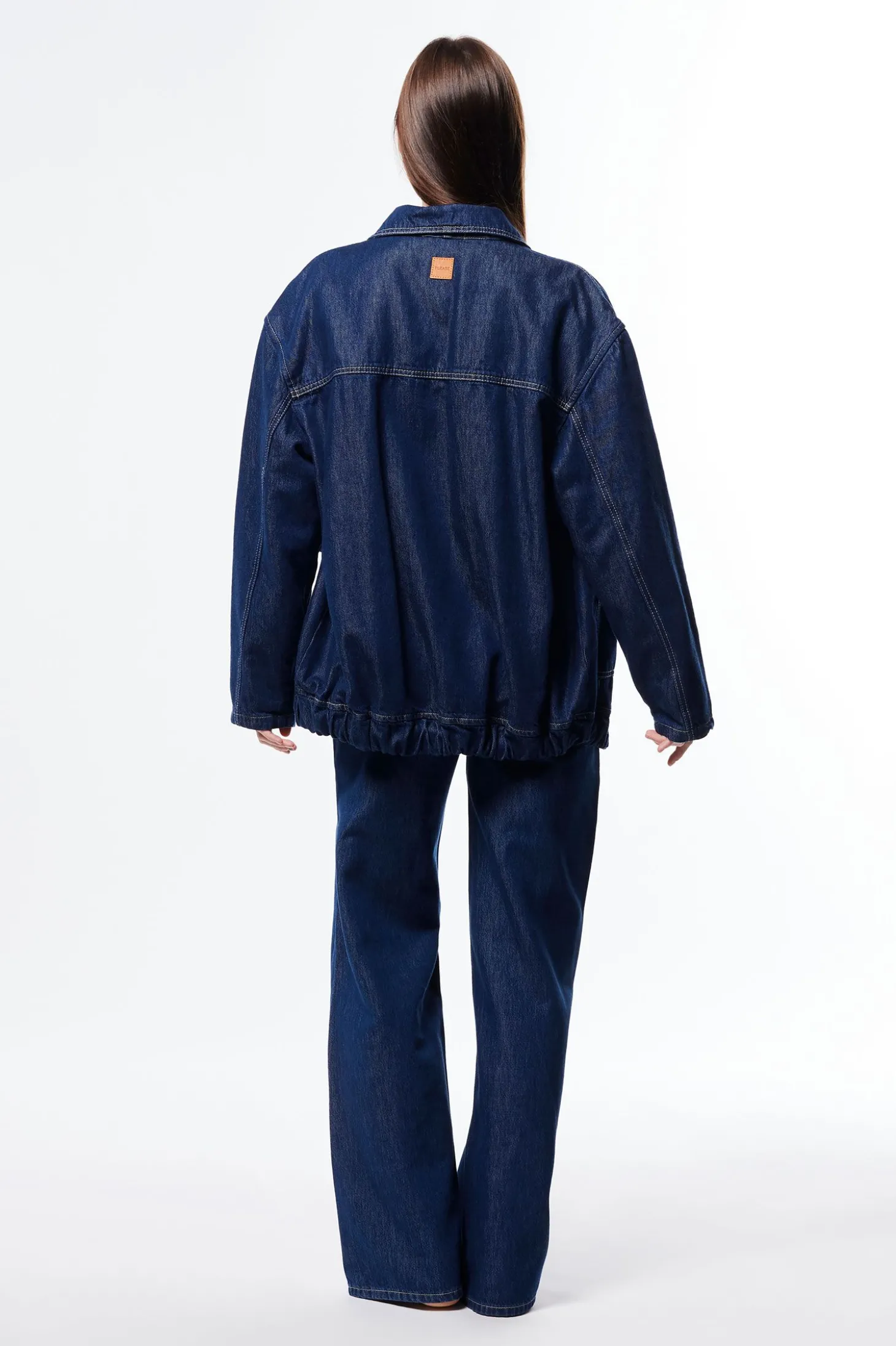 Jeans a gamba larga con vita media