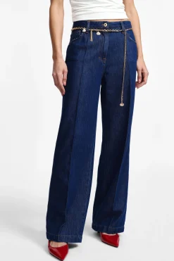 Jeans a gamba larga con vita alta e piega