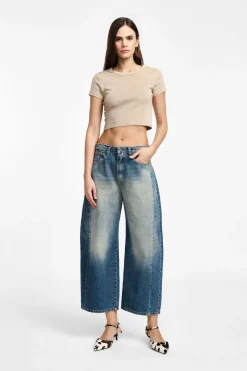 Jeans a gamba larga tapered con vita media