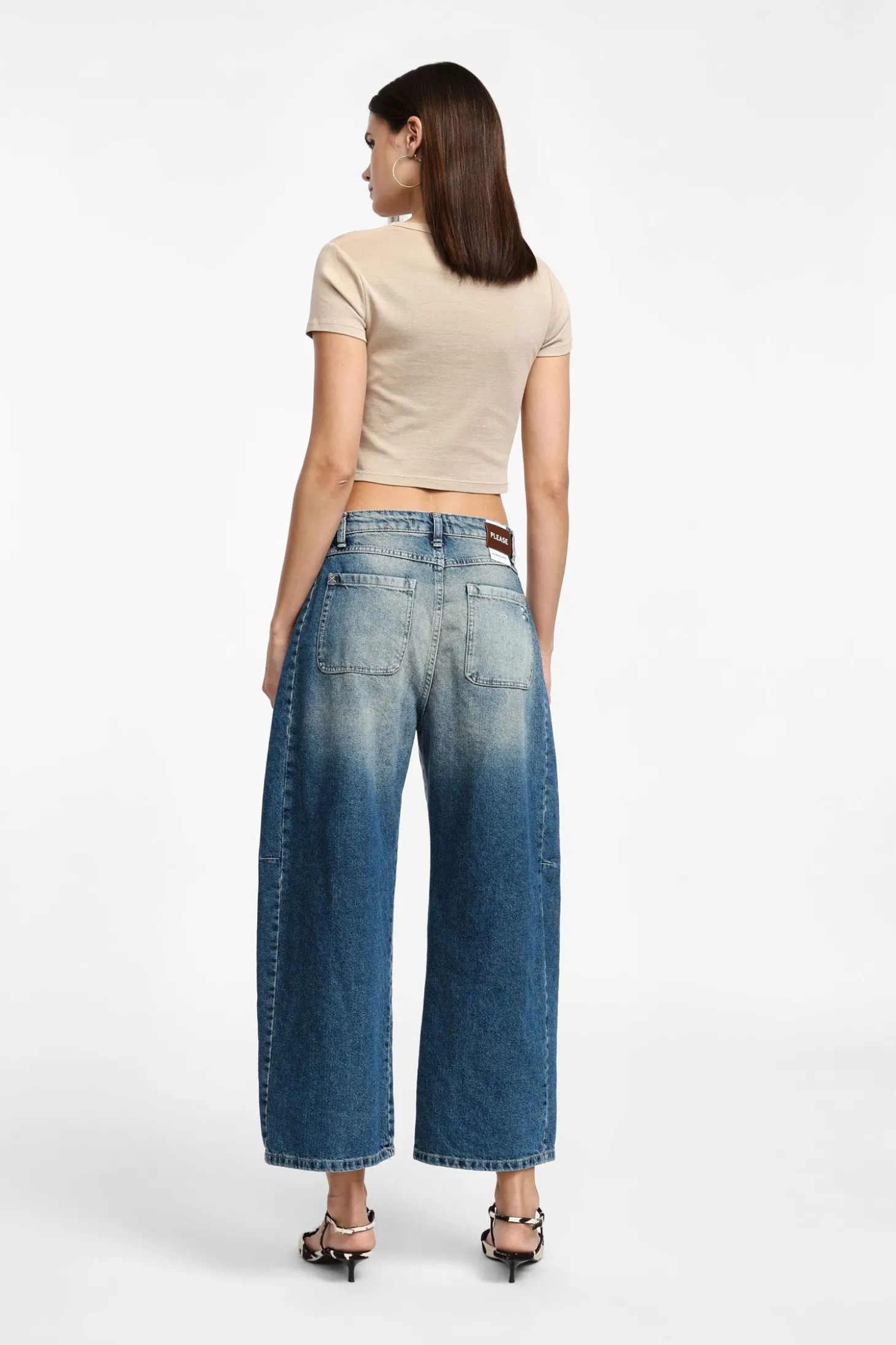 Jeans a gamba larga tapered con vita media