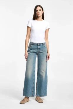 Jeans a gamba svasata con vita media