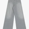 Jeans a zampa con righe e tasche
