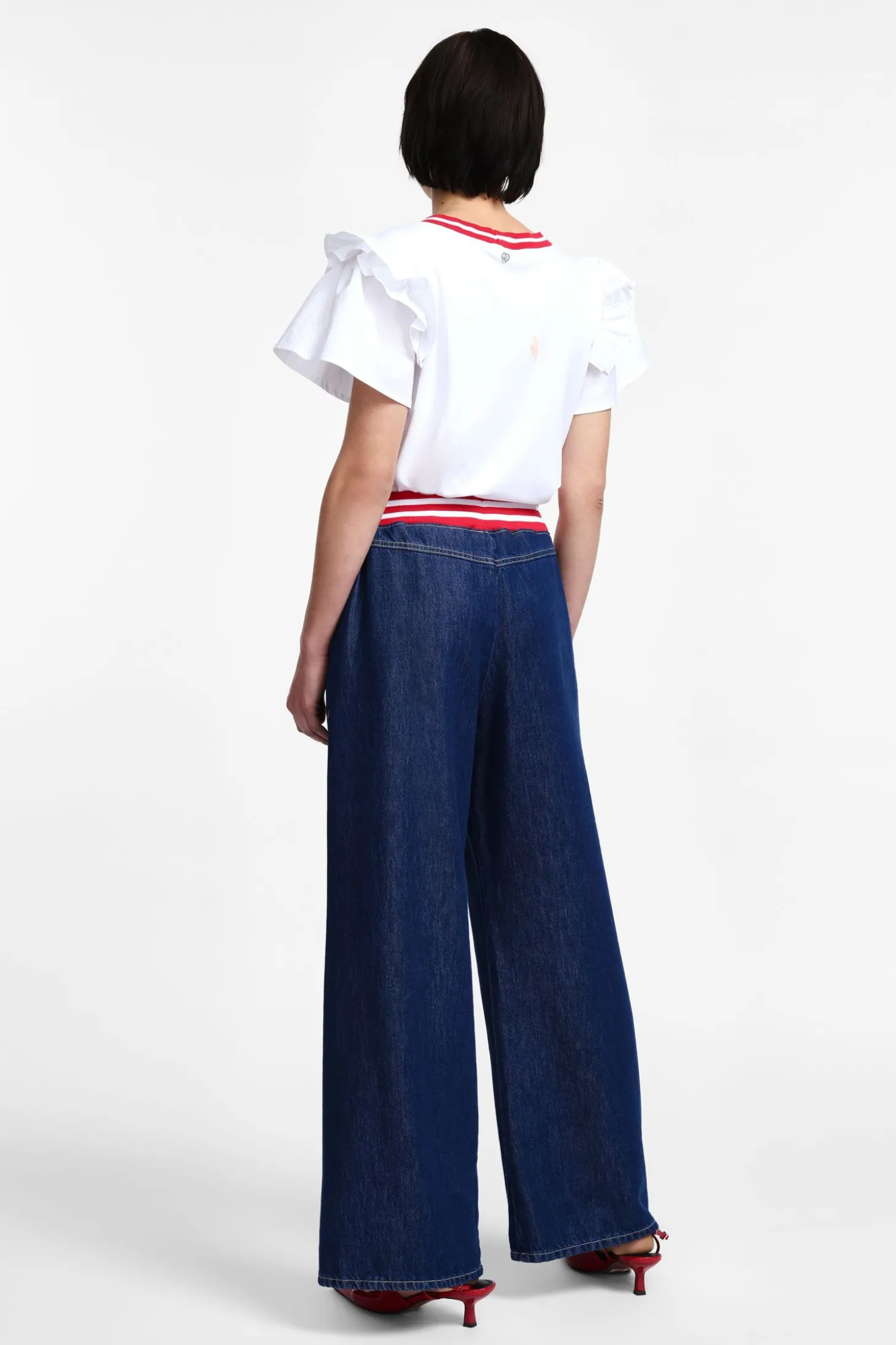Jeans con banda sportiva in vita