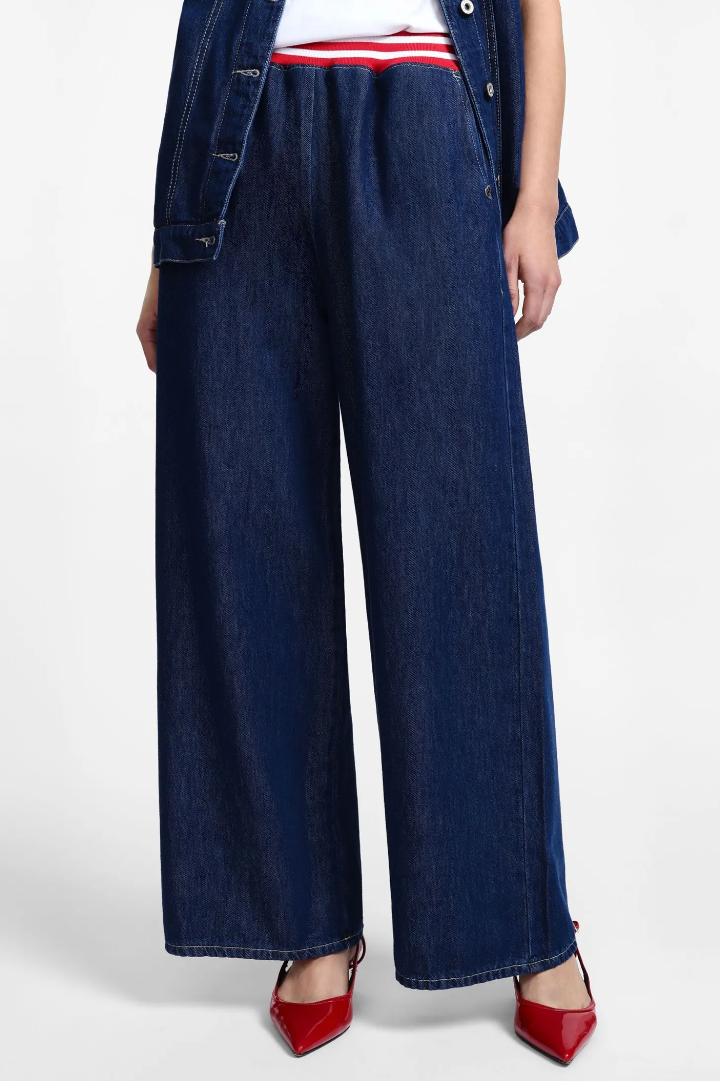 Jeans con banda sportiva in vita
