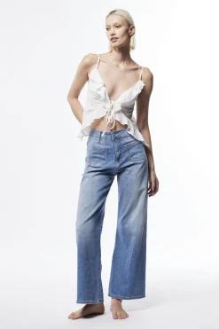 Jeans flare con vita media e tasche