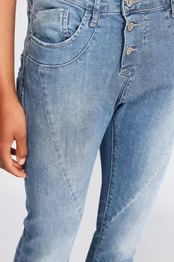 Jeans slim-fit effetto délavé con chiusura laterale e cuciture dettaglio