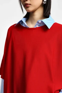 Jersey oversize liso con manga corta con vuelta