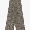 Pantalones acampanados con estampado animal