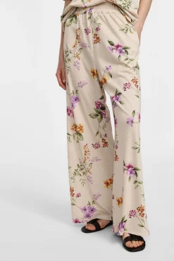 Pantalones amplios con estampado floral