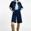 Pantalones cortos a la rodilla con cinco bolsillos