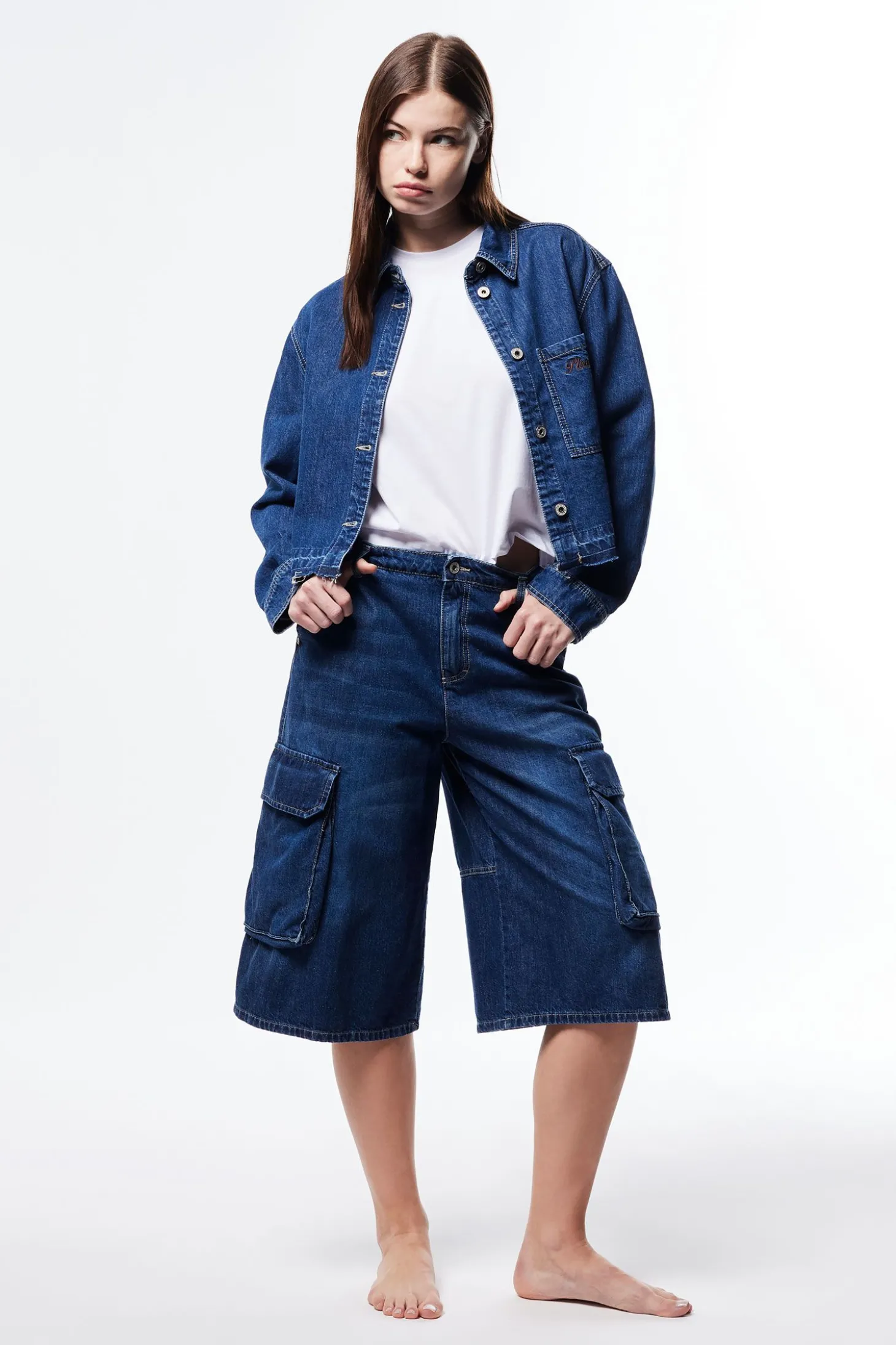 Pantalones cortos vaqueros a la rodilla con bolsillos