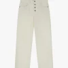 Pantalones holgados con bolsillos y botones visibles