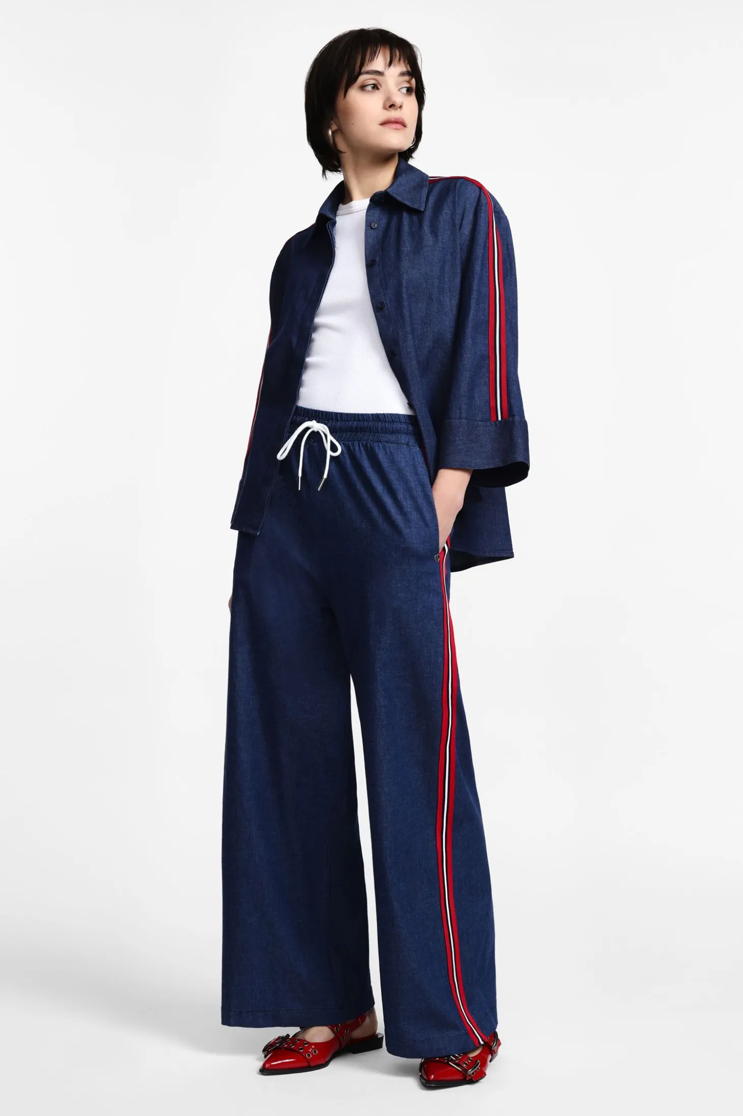 Pantalones palazzo con rayas laterales