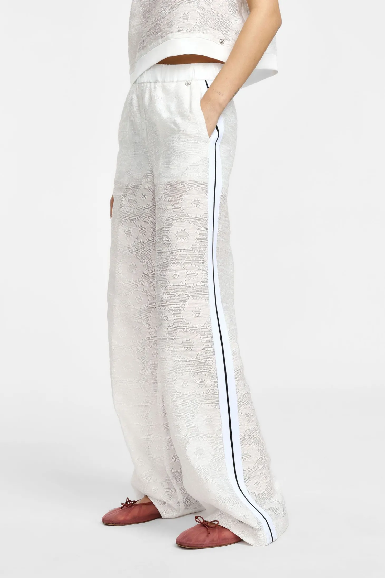 Pantalones palazzo de encaje con culotte