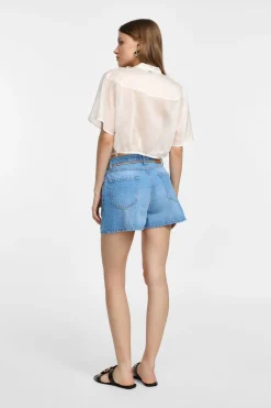 Shorts regulares con cordón y borlas