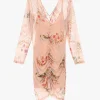 Vestido corto floral manga larga